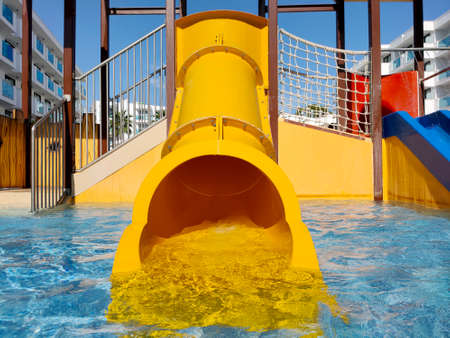 children's swing in the poolの写真素材