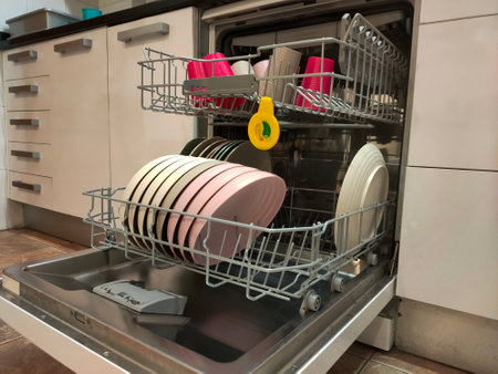 plastic dishes in the dishwasherの写真素材