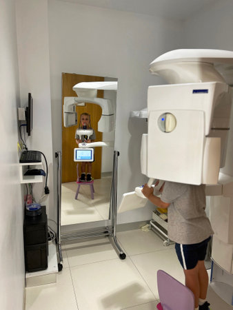 the child makes a general x-ray of the teethの写真素材