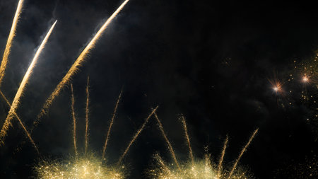 colorful golden fireworks in the evening sky