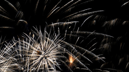 Bright fireworks background map. Beautiful bright fireworks isolated on black background. Christmas card, New Year holidaysの写真素材