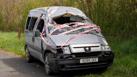 car after an accident, standing on the side of the road: N121B. April 1, 2024. direction: Urdax villageのeditorial素材