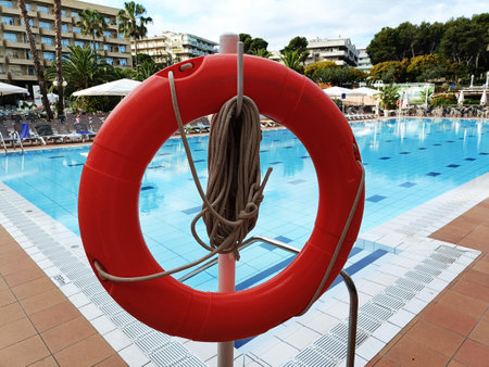 lifebuoy close-up, against the backdrop of the poolの写真素材