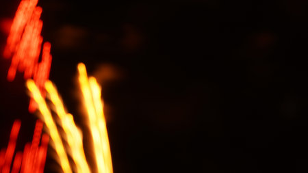 dark background with fiery underlining lines, red and yellow on the left sideの写真素材