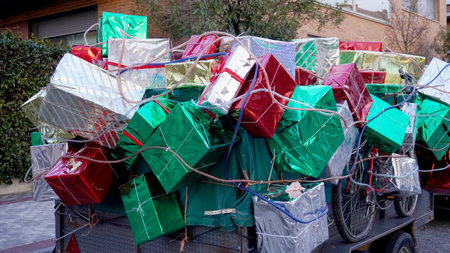 car trailer filled with gift boxes parked on the streetの写真素材