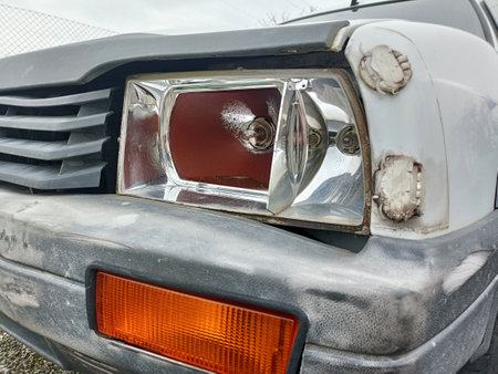 Broken car headlight close upの写真素材