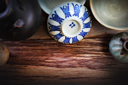 Thailand ceramic top view on wood background