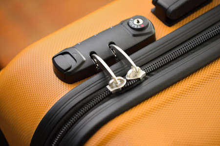 TSA accepted lock on luggage bag or suitcase (Transportation Security Administration of US). Response to the September 11 attacks. Air travel safety.の写真素材