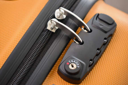 TSA accepted lock on luggage bag or suitcase (Transportation Security Administration of US). Response to the September 11 attacks. Air travel safety.の写真素材
