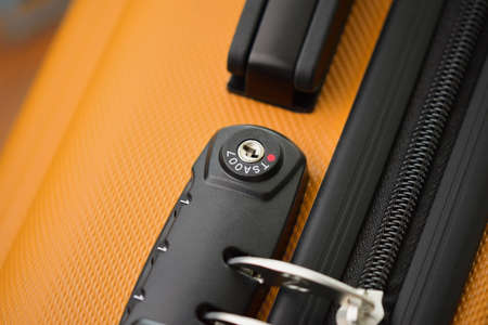 TSA accepted lock on luggage bag or suitcase (Transportation Security Administration of US)の写真素材