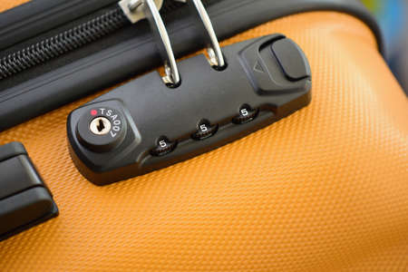 TSA accepted lock on luggage bag or suitcase (Transportation Security Administration of US)の写真素材