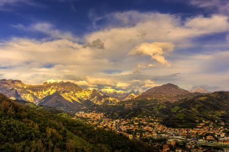 Panoramic view of city of Carrara before the sunsetの写真素材