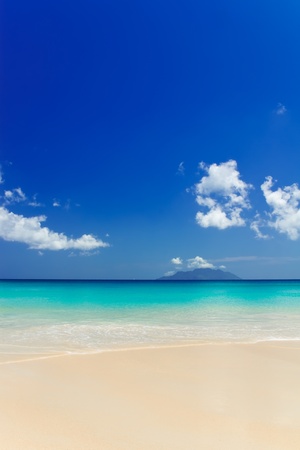 Tropical white sand beach and blue sky.の写真素材