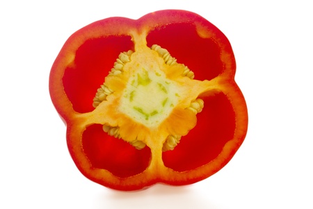 Cross section of a red pepper isolated on white backgroundの写真素材