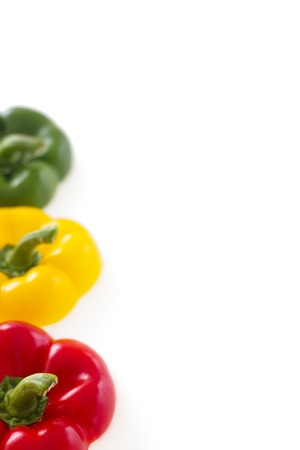 Three pepper bell tops isolated on white backgroundの写真素材