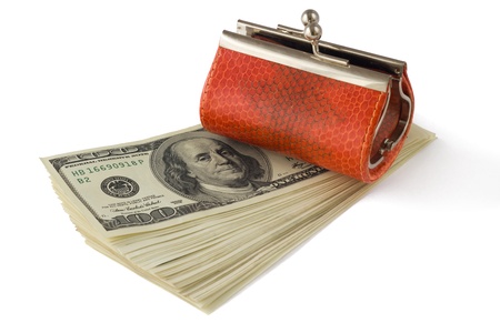 Orange leather wallet on stack of money, isolated on white backrgoundの写真素材
