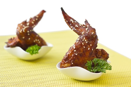 Grilled chicken wings with sesame seeds の写真素材