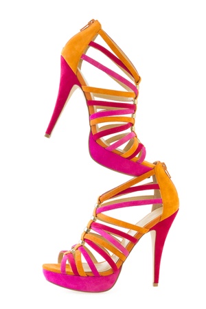 Pare of pink and orange shoes, vertical, isolate on white background   の写真素材