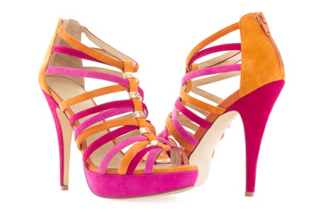 Pare of pink and orange shoes isolated on white background   の写真素材
