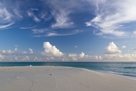 Sky, sand, sea and cloudsの写真素材