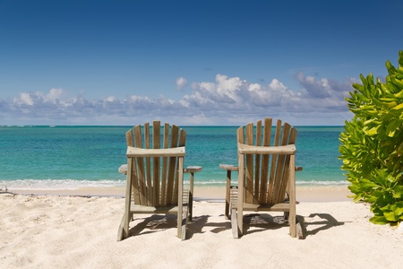 Resting Chairs on the beautiful sandy beach near the seaの写真素材