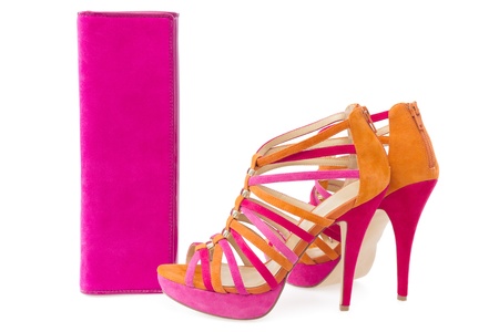 Pare of pink and orange shoes and a matching bag, isolate on white の写真素材