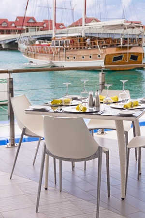 Table settings at restaurant on islandの写真素材