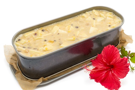 Fresh fruit cake butter in metal form ready to go in oven  の写真素材
