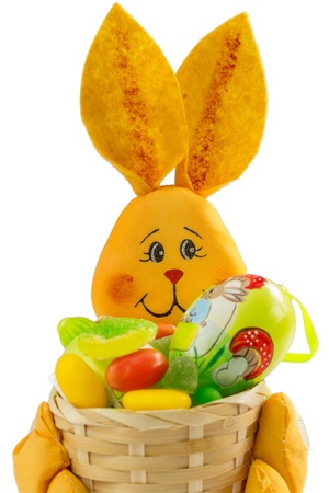 Easter Bunny basket and sweets and  Easter Egg, on White Backgroundの写真素材