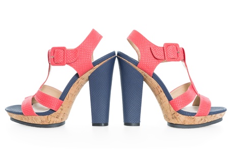 Pair of trendy navy blue and pink shoes, isolated on white backgroundの写真素材