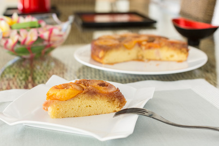 Slice of plum cake on serving plateの写真素材