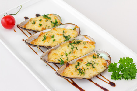 Baked Mussels under Cream Cheese Sauceの写真素材