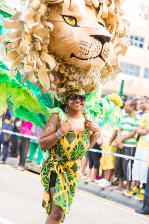 Victoria, Seychellesâ April 26, 2014: Performer from Notting hill carnival group  at the Carnival International de Victoria in Seychellesのeditorial素材