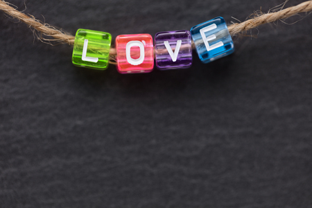 LOVE word concept on dark backgroundの写真素材