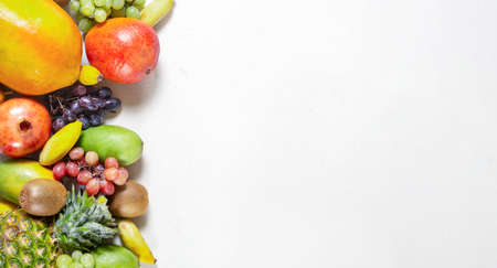 Mixed fruits and berries background. Healthy eating, dieting.の写真素材