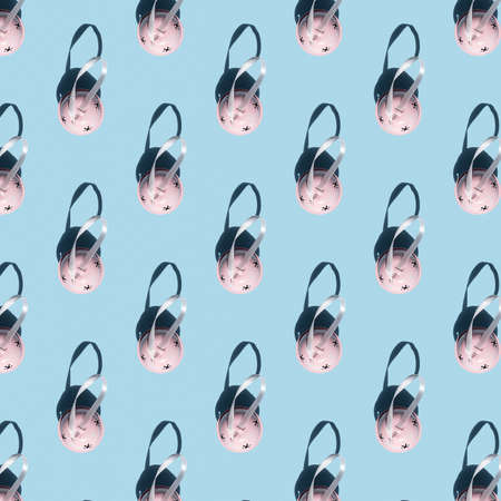 Seamless pattern of pink Christmas round ball with shadows on light blue backgroundの写真素材