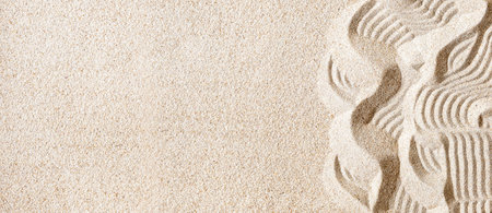 Clean sand on the beach with pattern as background, copy space, banner
