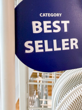 Penang, Malaysia â April 23, 2025: A best seller sign captures attention in a retail environment, indicating popular items for shoppers seeking quality options.の写真素材