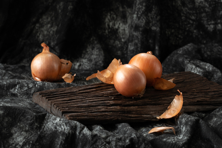 onion fresh ingredient vegetable cooking on wood vintage styleの写真素材