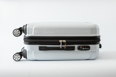 white luggage hat travel journey to destination long weekend holiday on white backgroundの写真素材