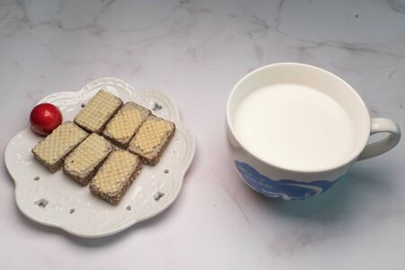 breakfast with biscuits and milkの写真素材