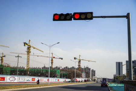 Traffic lights on the city road under constructionのeditorial素材