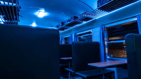 Vintage train carriage at night