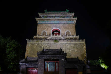 Beijing's clock tower at nightの写真素材