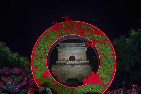 Beijing's clock tower at nightの写真素材