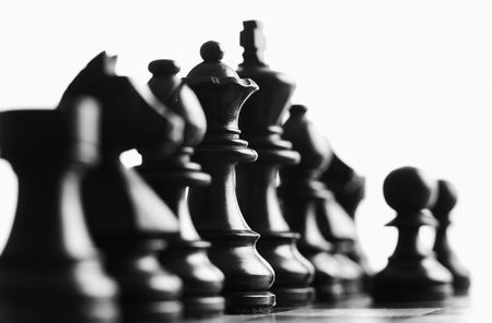 Close up of black chess pieces foucs on the queenの写真素材