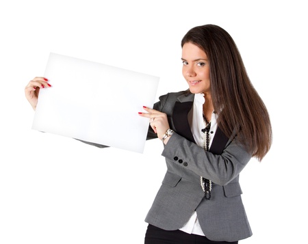 girl holds a piece of paperの写真素材