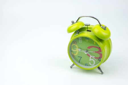 Alarm clock on white backgroundの写真素材