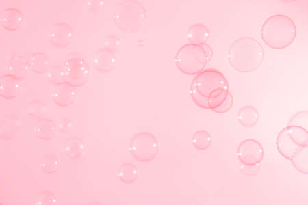 Abstract Beautiful Pink Soap Bubbles Background. Soap Sud Bubbles Water.の写真素材