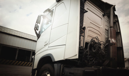 Semi Trucks on The Parking Lot at Warehouse. Tractor Truck. Trucking. Freight Truck Logistics Transportの写真素材